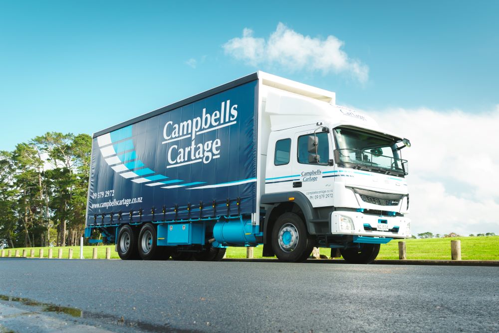 Campbells cartage freight truck parked in lot